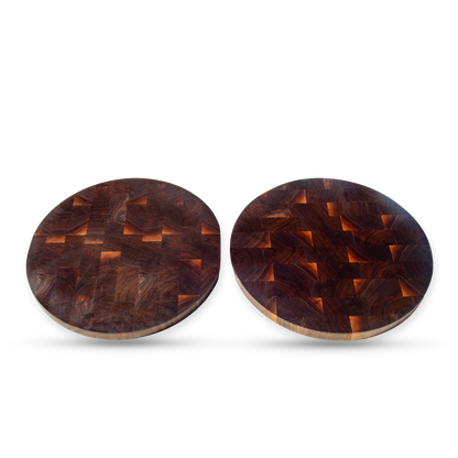 Lucia and Luca, the pair of round walnut end-grain pizza boards, shown together